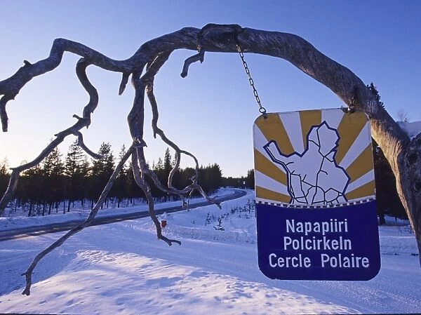 Sign indicating entry to Arctic Circle north of Kuusamo Finnish Lapland winter