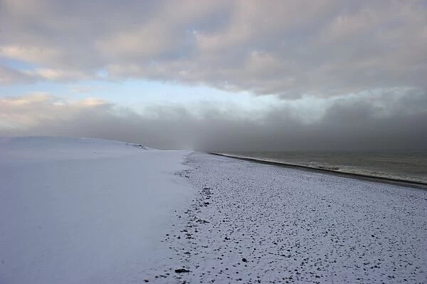 Snow covered beach at Salthouse Norfolk December