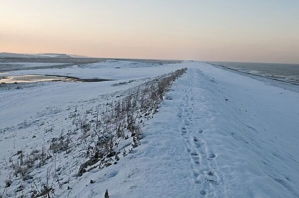 Snow covered beach at Salthouse Norfolk December