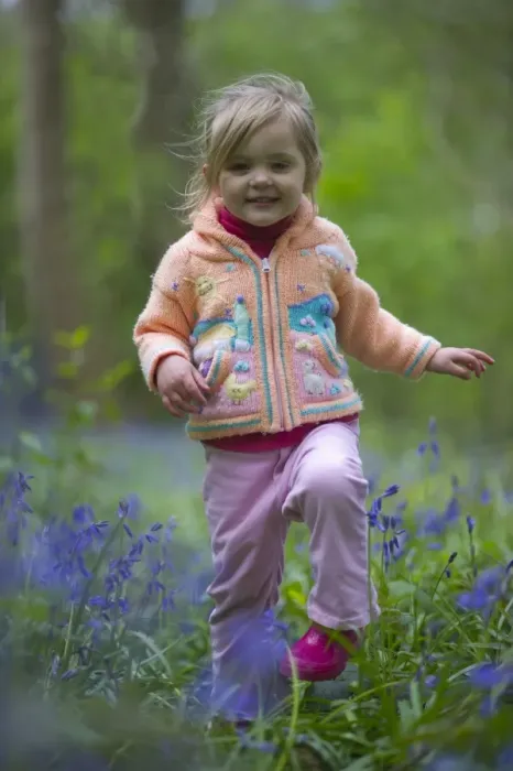 Framed Print : Young girl in Bluebell Wood North Norfolk May UK Framed Print : Young girl in Bluebell Wood North Norfolk May UK