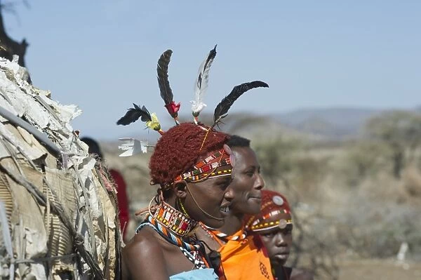 Young Masai man wearing Ostrich feathers signifying recent circumsision Samburu Kenya