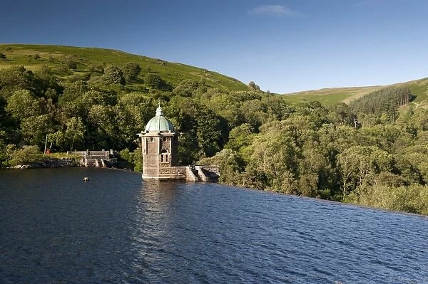Dam overflow and pumping house on reservoir, Penygarreg Reservoir, Elan Valley, Powys, Wales, July