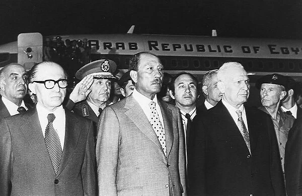 President Anwar Sadat (1918-1981) President of Egypt, centre, with the Israeli Prime Minister
