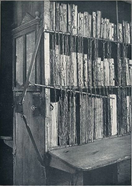Bookcase, 15th century, with some later editions, and catalogue frame, 17th century, c1931