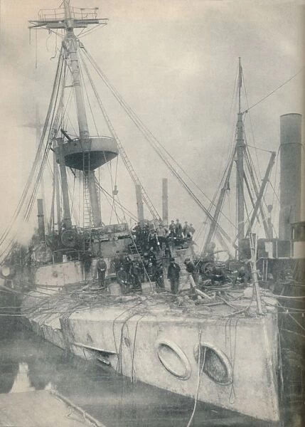 A Salvage Triumph. The cruiser Gladiator, supported by salvage tugs, 1908, (1936)