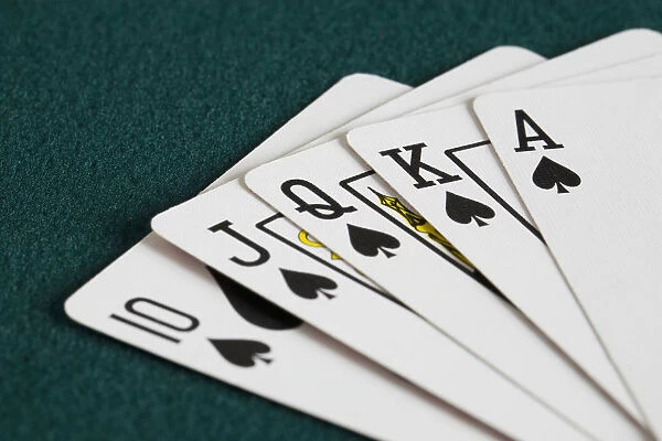 Close-Up Of Blackjack Playing Cards Showing Spades Royal Flush
