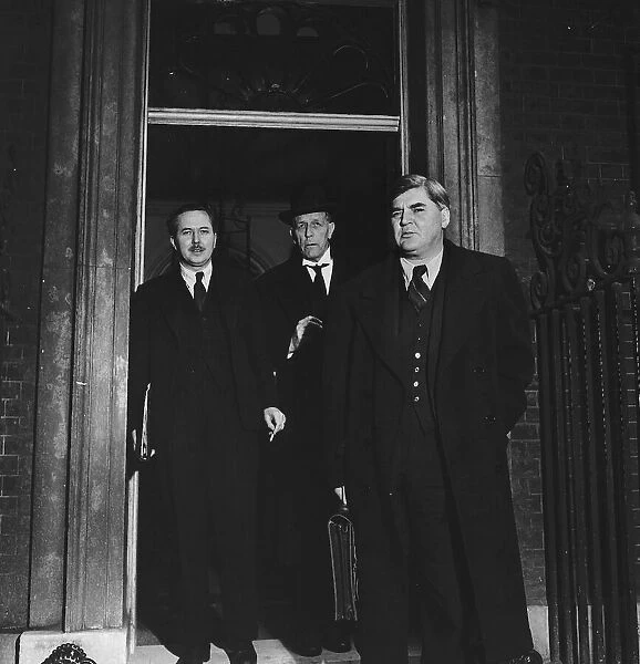 The baby of the Cabinet Harold Wilson leaves 10 Downing Street with Aneurin Bevan