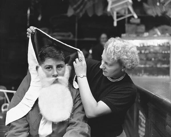 Father Christmas Geoffrey Hall aged 15 seen here at Bushlan Department Store at Stoke