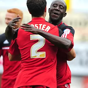 Adomah and Foster Celebrate Goal: Bristol City vs. Blackburn Rovers, Championship Football Match, Ashton Gate Stadium, 2012