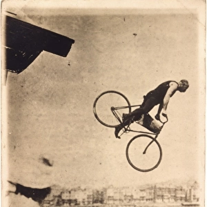 Edward Reddish riding his bicycle off Worthing Pier