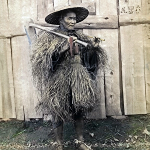 Farmer in grass coat, Japan