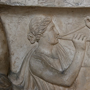 Roman Art. Woman Playing double flute