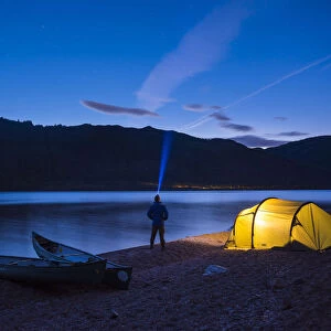 Camping at Loch Ness at night while canoeing the Caledonian Canal, Scottish Highlands