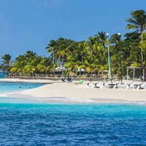 Catamarans on a beautiful palm fringed white sand beach on Palm Island, The Grenadines, St. Vincent and the Grenadines, Windward Islands, West Indies, Caribbean, Central America