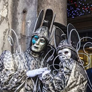 Colourful masks and costumes of the Carnival of Venice, famous festival worldwide