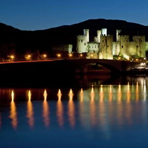 Conwy Castle and town at dusk, Conwy, Wales, United Kingdom, Europe