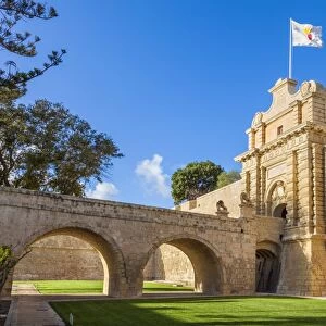 The Main gate with moat, garden and ramparts, Mdina, a Medieval walled city, Mdina, Malta, Europe
