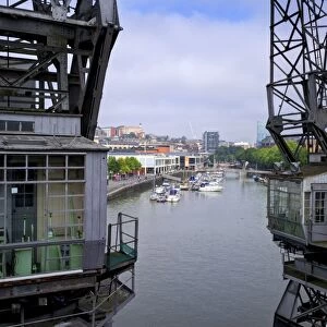 Old dockside cranes frame the harbour, Bristol, England, United Kingdom, Europe