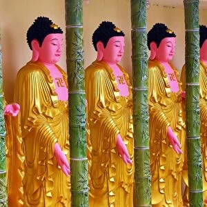 Gold Buddha statues at Kek Lok Si Buddhist Temple, Georgetown, Penang, Malaysia