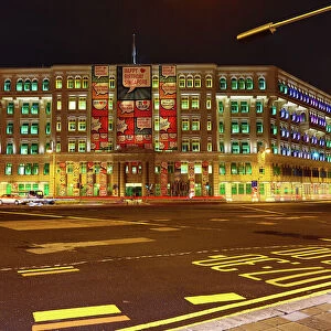 Rainbow coloured lights in the windows of the Old Hill Street Police Station housing the Ministry of Communications and Information in Singapore, Republic of Singapore