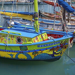 Colorful boats (called Pointu), in the port of Sanary-sur-Mer, Var department, Provence-Alpes-Cote d'Azur, Mediterranean Sea, French Riviera, France