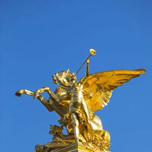 Golden statue on the Pont Alexandre III, Paris, France