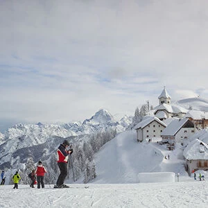 Italy, Friuli Venezia Giulia, Ski slope with a view to Mount Lussari