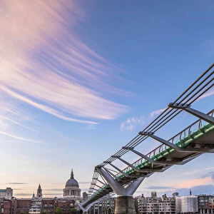 Millennium Bridge and St. Pauls Cathedral at sunset, City of London, London, UK