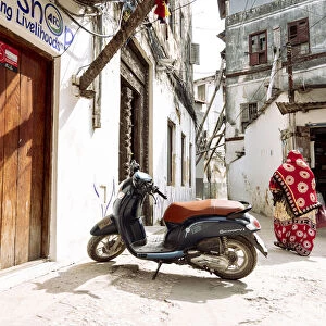 Scooter in streets of Stonetown, Zanzibar, Tanzania