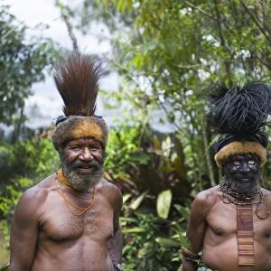 Clan chiefs at Paiya in Western Highlands Papua New Guinea Note Cassowary feather
