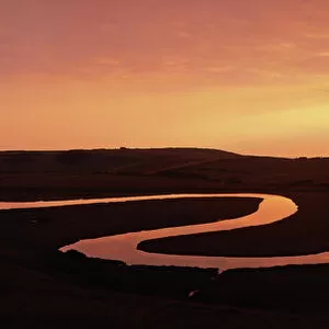 Cuckmere River, showing oxbow lakes at dusk, Cuckmere Haven, Sussex, summer
