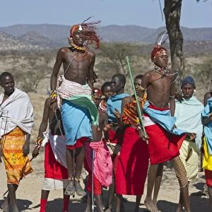 Masai warrior jump dance being performed for tourists Samburu Kenya