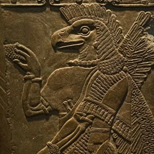 Sculptured wall relief depicting an Eagle headed protective Spirit from Temple of