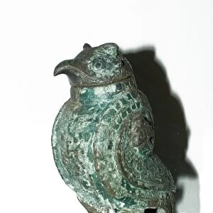 Wine vessel in the shape of an owl dating back to the Shang Dynasty in China 1250-1055 BC