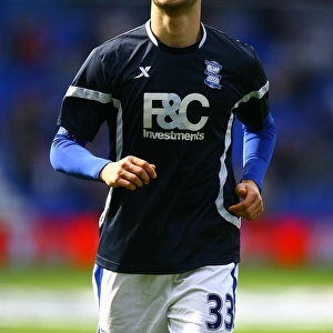 Determined Alpaslan Ozturk in Birmingham City's FA Cup Sixth Round Clash Against Bolton Wanderers at St. Andrew's