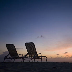 Cayman Islands, Grand Cayman Island, George Town, Beach chairs along Seven Mile Beach