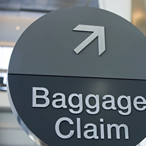 A round Baggage Claim sign at San Francisco International airport - San Francisco