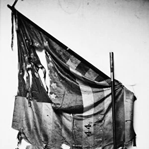 CIVIL WAR: UNION FLAG. Tattered flag of the 44th New York Infantry, during the Civil War. Photograph, c1863