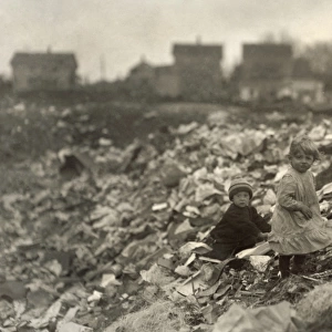 HINE: GARBAGE DUMP, 1912. Children in a dump in Rhode Island. Photograph by Lewis Wickes Hine