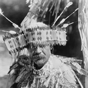 POMO DANCER, c1924. A Pomo Native American from California in traditional dance costume
