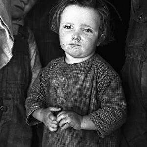 POVERTY: CHILD, 1936. Impovished girl of a family living on The Natchez Trace Project