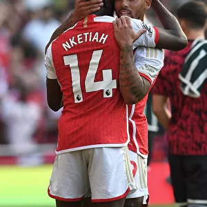 Arsenal's Nketiah and Jesus Celebrate Victory Over Manchester United in 2023-24 Premier League