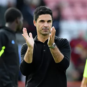 Arsenal's Triumph at Bournemouth: Mikel Arteta Celebrates with Elated Fans