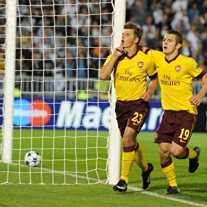 Arshavin and Wilshere: Celebrating Arsenal's First Goal in Champions League Victory over Partizan Belgrade