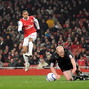 Gael Clichy scores Arsenals 5th goal past Goalkeeper Jamie Jones and under pressure from Andrew Whing (Orient). Arsenal 5: 0 Leyton Orient. FA Cup 5th Round Replay. Emirates Stadium, 2 / 3 / 11. Credit : Arsenal Football Club /