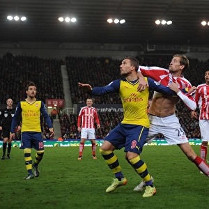 Podolski vs Crouch: Intense Battle at Britannia Stadium - Stoke City vs Arsenal, Premier League 2014-15