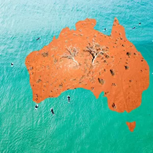 Map of Australia with red desert in the center and surfers in the ocean around the
