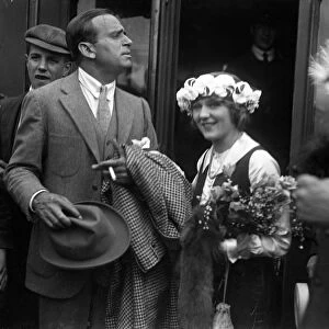 American actors Douglas Fairbanks and his wife Mary Pickford at Waterloo Station