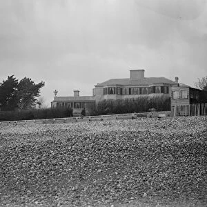 Craigwell House, Aldwick, Sussex. a view from the sea front showing a policeman