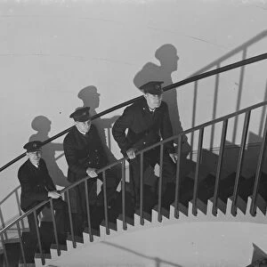 LIghthouse keepers walking up the spiral staircase inside the Dungeness lighthouse, Kent